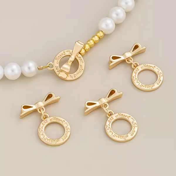 Brass 14K Gilded Pinch / OT Clasp Bow Sticker