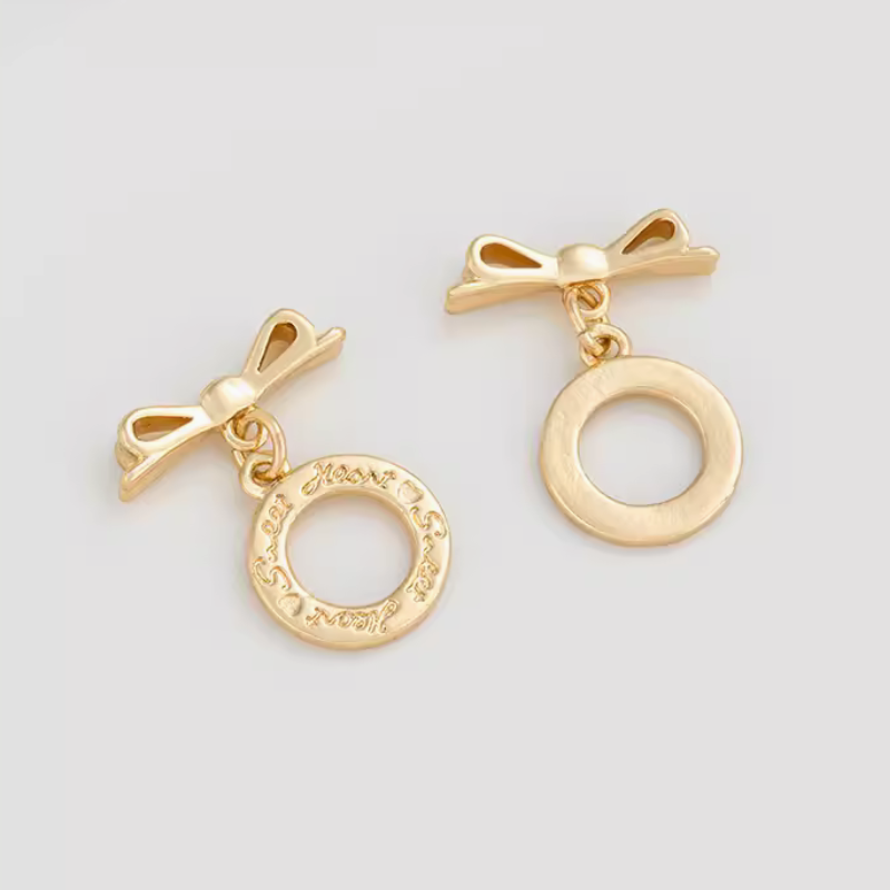 Brass 14K Gilded Pinch / OT Clasp Bow Sticker