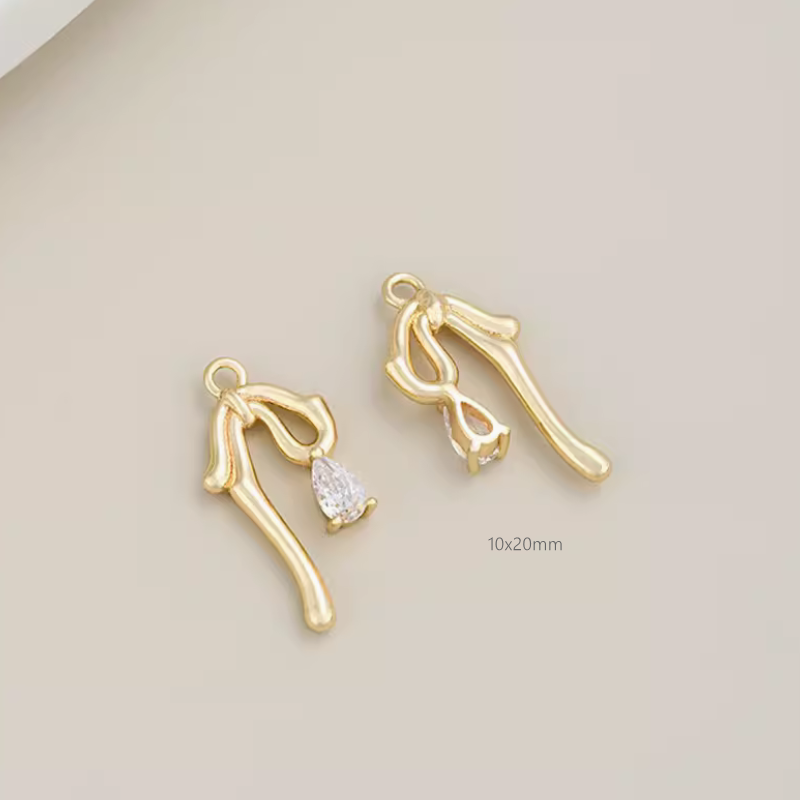 Brass Electroplated Zircon Bow Pendant