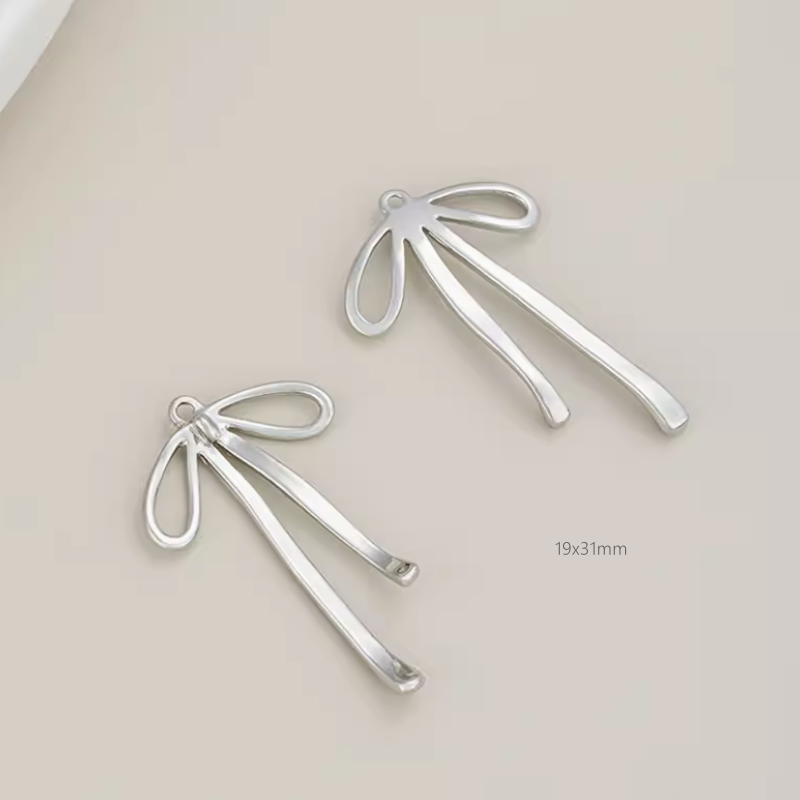 Brass Electroplated Zircon Bow Pendant
