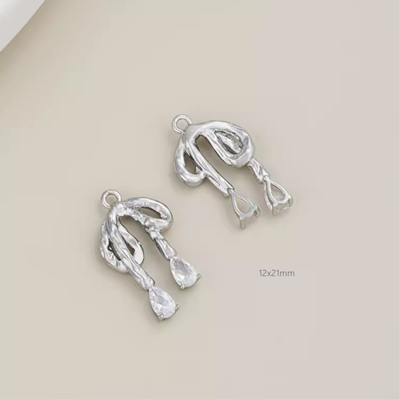 Brass Electroplated Zircon Bow Pendant