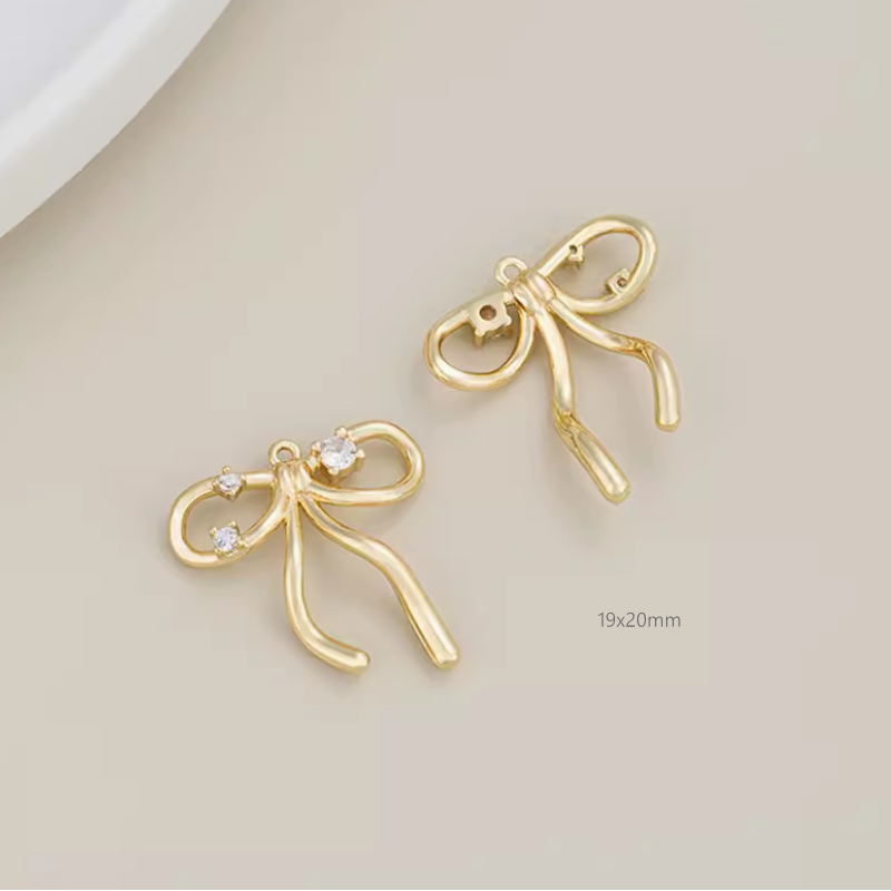 Brass Electroplated Zircon Bow Pendant