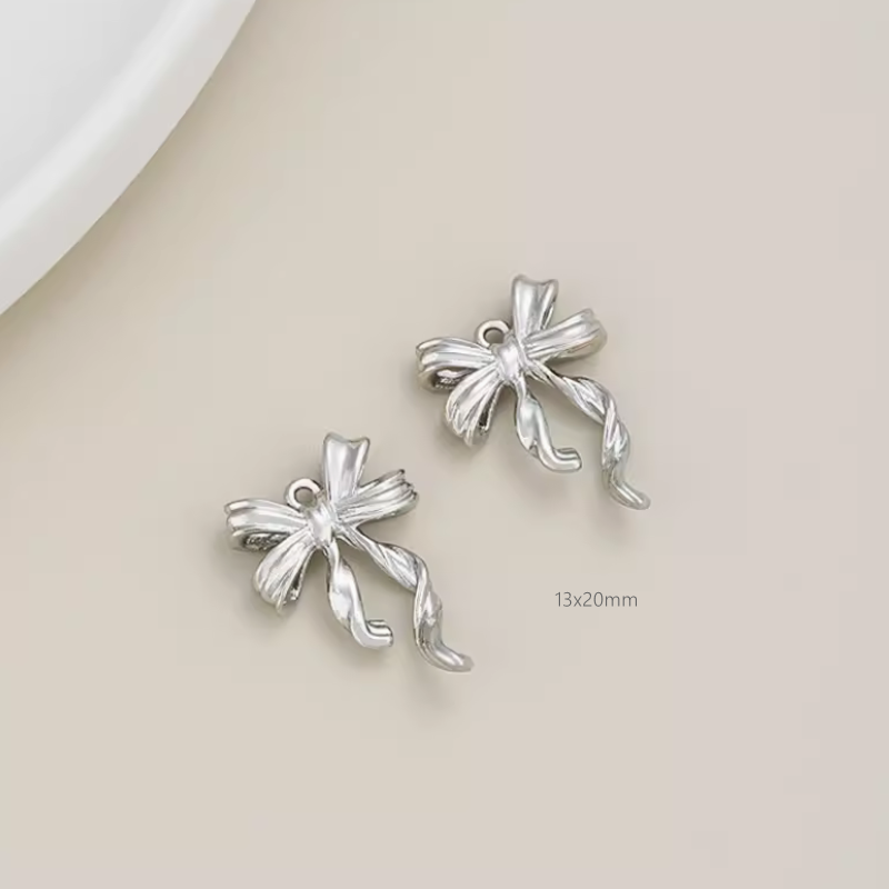 Brass Electroplated Zircon Bow Pendant